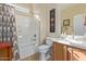 Clean bathroom with tub shower combo and vanity at 21532 N 262Nd Ln, Buckeye, AZ 85396