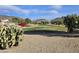 View of a golf course with mountains in the background at 21918 N 66Th Ln, Glendale, AZ 85310