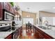 Modern kitchen with granite counters and stainless steel appliances at 21918 N 66Th Ln, Glendale, AZ 85310