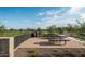 Brick paved seating area with benches and modern landscaping at 2224 W Chisum Trl, Phoenix, AZ 85085