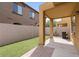 Private backyard with covered patio and artificial turf at 2250 E Deer Valley Rd # 77, Phoenix, AZ 85024