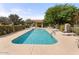 Community pool with lounge chairs and shaded seating area at 2250 E Deer Valley Rd # 77, Phoenix, AZ 85024