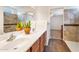 Elegant bathroom with double sinks, tiled shower, and plenty of light at 23677 N Desert Dr, Florence, AZ 85132