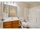 Clean bathroom featuring a single sink vanity, toilet, and bathtub at 23677 N Desert Dr, Florence, AZ 85132