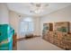 Bedroom with several moving boxes and a ceiling fan at 23677 N Desert Dr, Florence, AZ 85132