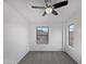 Bright bedroom with ceiling fan and grey carpeting at 2401 E Rio Salado Pkwy # 1038, Tempe, AZ 85288