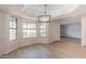 Charming breakfast nook with large windows and a chandelier at 249 E Grandview St, Mesa, AZ 85201