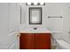 Bathroom features wood vanity and modern fixtures at 2635 E Desert Wind Dr, Casa Grande, AZ 85194