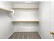 Walk-in closet with double hanging rods and shelving at 2635 E Desert Wind Dr, Casa Grande, AZ 85194