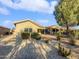 Charming single-story home with desert landscaping at 2635 E Desert Wind Dr, Casa Grande, AZ 85194