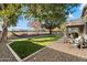 Relaxing backyard with artificial turf and hammock at 2726 S Keene --, Mesa, AZ 85209