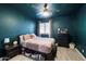 Cozy bedroom with a queen-size bed and ceiling fan at 2726 S Keene --, Mesa, AZ 85209