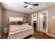 Spacious bedroom with a king-size bed and access to a walk-in closet at 2769 E Cedar Pl, Chandler, AZ 85249