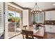 Kitchen dining area with sliding glass doors to backyard at 2769 E Cedar Pl, Chandler, AZ 85249