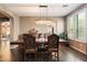 Formal dining room with hardwood floors, chandelier and access to kitchen at 2769 E Cedar Pl, Chandler, AZ 85249