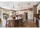 Modern kitchen with granite island and stainless steel appliances at 2769 E Cedar Pl, Chandler, AZ 85249