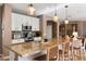 Large kitchen island with seating and ample counter space at 2769 E Cedar Pl, Chandler, AZ 85249