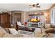 Cozy living room showcasing a stone accent wall and fireplace at 2769 E Cedar Pl, Chandler, AZ 85249