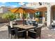 Outdoor patio with seating area, umbrella, and built-in grill at 2769 E Cedar Pl, Chandler, AZ 85249