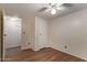 Bedroom with wood-look floors and spacious closet at 2881 W Cactus Wren St, Apache Junction, AZ 85120