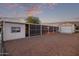 Mobile home with covered patio and detached garage at 2881 W Cactus Wren St, Apache Junction, AZ 85120