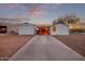 Mobile home with carport and paved driveway, set against a desert landscape at 2881 W Cactus Wren St, Apache Junction, AZ 85120