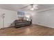 Living room featuring hardwood floors and a ceiling fan at 2881 W Cactus Wren St, Apache Junction, AZ 85120