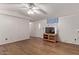 Living room with hardwood floors and a ceiling fan at 2881 W Cactus Wren St, Apache Junction, AZ 85120