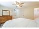 Spacious bedroom with double closet and ceiling fan at 2911 W Lamar Rd, Phoenix, AZ 85017