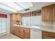 Well-equipped kitchen with granite countertops and updated cabinets at 2911 W Lamar Rd, Phoenix, AZ 85017