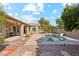 Relaxing backyard oasis with a pool and patio at 3165 E Indigo Bay Dr, Gilbert, AZ 85234