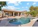 Spacious backyard with a pool and patio area at 3165 E Indigo Bay Dr, Gilbert, AZ 85234