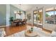 Formal dining room with hardwood floors and sliding glass doors to the backyard at 3165 E Indigo Bay Dr, Gilbert, AZ 85234