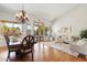 Bright dining room and living area with hardwood floors at 3165 E Indigo Bay Dr, Gilbert, AZ 85234