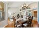 Elegant dining room features a large wood table and chandelier at 3165 E Indigo Bay Dr, Gilbert, AZ 85234