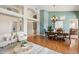 Open concept dining room with hardwood floors and chandelier at 3165 E Indigo Bay Dr, Gilbert, AZ 85234