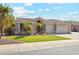 Single-story home with a two-car garage and nicely landscaped front yard at 3165 E Indigo Bay Dr, Gilbert, AZ 85234