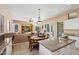 Kitchen with an eat-in area and views into the Gathering room at 3165 E Indigo Bay Dr, Gilbert, AZ 85234