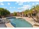 Inviting kidney-shaped pool with a rock waterfall feature at 3165 E Indigo Bay Dr, Gilbert, AZ 85234