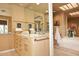 Bathroom with double vanity, soaking tub and shower at 4015 N 78Th St # 141, Scottsdale, AZ 85251