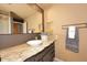 Updated bathroom with granite countertop, modern vanity, and stylish fixtures at 4015 N 78Th St # 141, Scottsdale, AZ 85251