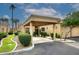 Covered carport with lush landscaping and nicely manicured bushes at 4015 N 78Th St # 141, Scottsdale, AZ 85251