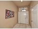 Bright entryway with tile flooring and large artwork at 4015 N 78Th St # 141, Scottsdale, AZ 85251