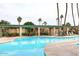 Relaxing community pool area with plenty of lounge chairs at 4015 N 78Th St # 141, Scottsdale, AZ 85251