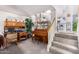 Indoor staircase leading to the upper level, with a view of the kitchen at 4043 W Saguaro Park Ln, Glendale, AZ 85310