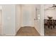 Bright entryway with tiled floors, leading to a dining area at 42899 W Whimsical Dr, Maricopa, AZ 85138