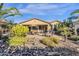 Desert landscaping with patio furniture and fire pit at 4531 E Jude Ln, Gilbert, AZ 85298