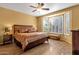 Spacious main bedroom with wood flooring and large window at 4531 E Jude Ln, Gilbert, AZ 85298