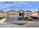 Single-story home with desert landscaping and two-car garage at 4531 E Jude Ln, Gilbert, AZ 85298