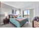 Serene bedroom with city views and mid-century modern furniture at 4750 N Central Ave # N16, Phoenix, AZ 85012